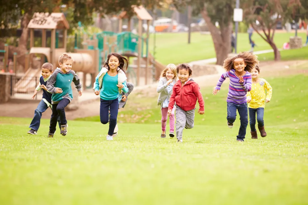 Children playing and running outdoors